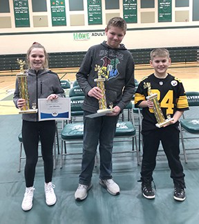 Three winners of the spelling bee.